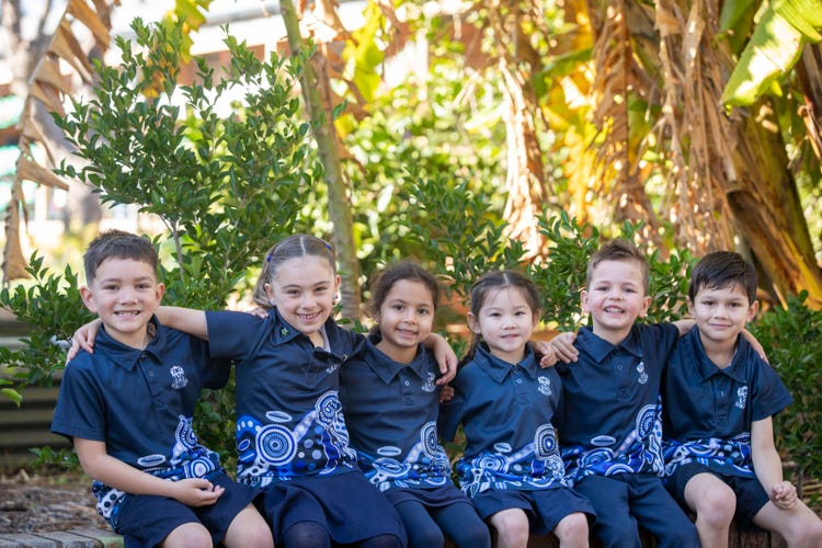 Students sitting in the gardens