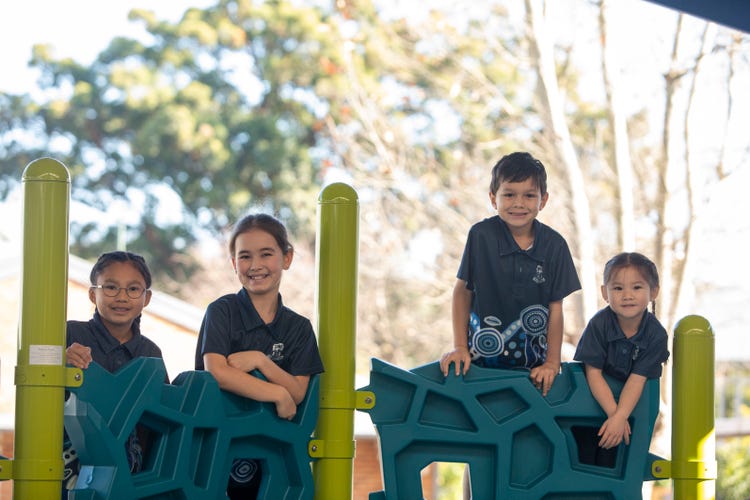 Students on playground equipment