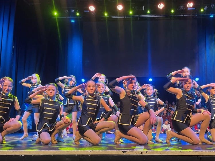 Dancers on stage at a performance